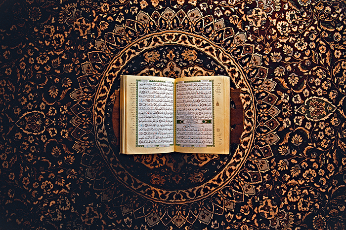 Coran sur un tapis